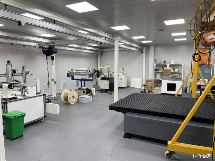 Assembly and metrology hall — granite tables and overhead cranes